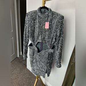 Silver mini dress with side slit.